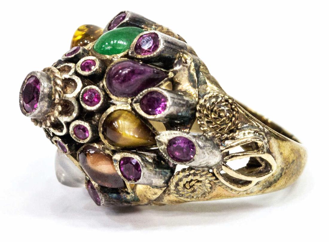 LADIES ESTATE 14K GOLD & GEMSTONE PRINCESS RING: Ladies estate 14kt yellow gold gemstone princess ring, the tiered mount set with (19) round cut red stones, accented by (8) cabochon pear cut gemstones, marked in band, size 8.5, 12.6 grams (inclusive