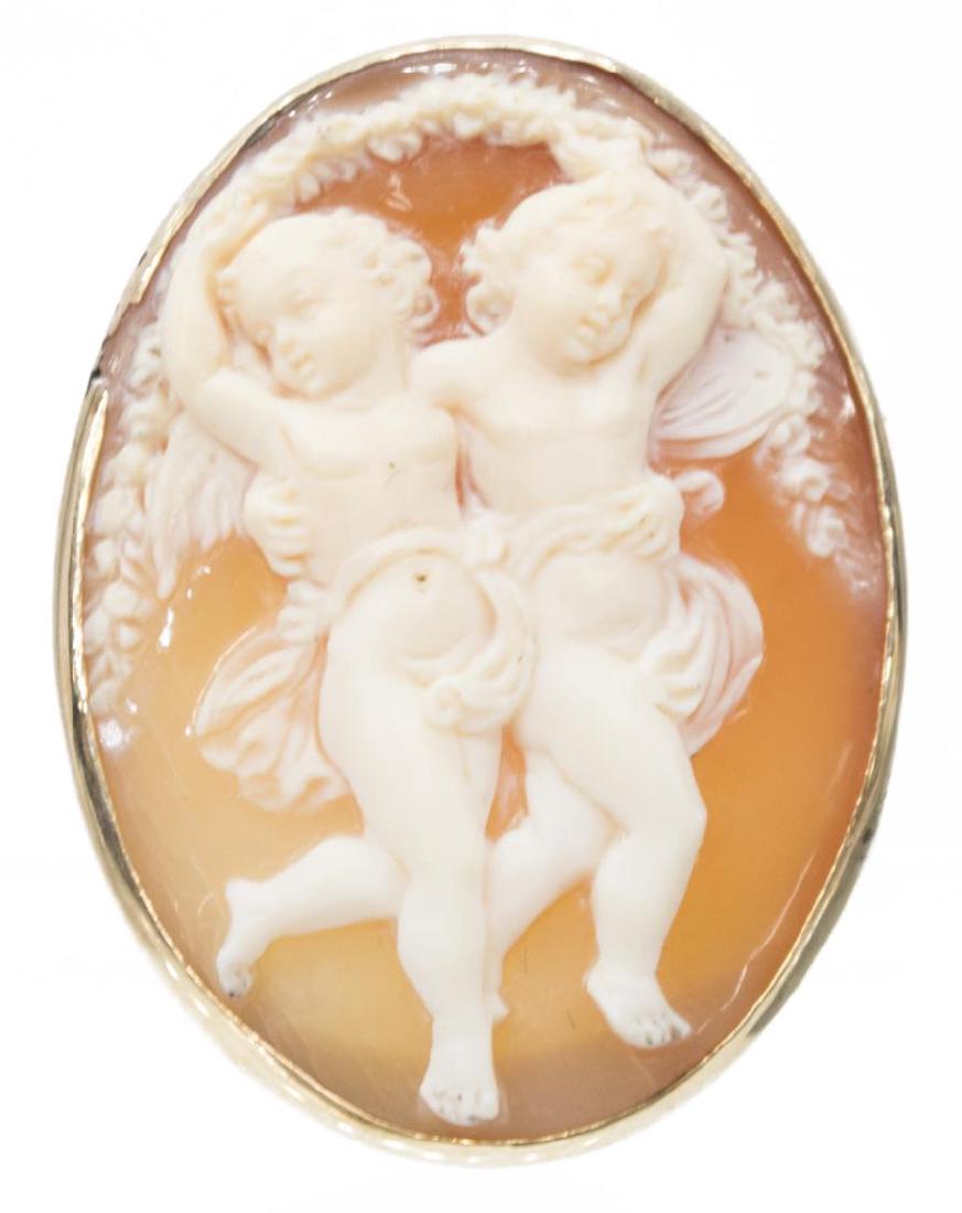 LADIES ESTATE 14K GOLD & CARVED SHELL CAMEO BROOCH: Ladies estate 14kt yellow gold and carved shell cameo brooch, depicting two embracing putti holding floral garland, unmarked, 1.25"l, 6.3 grams (inclusive of all material) (B014) Start Price: $150.00
