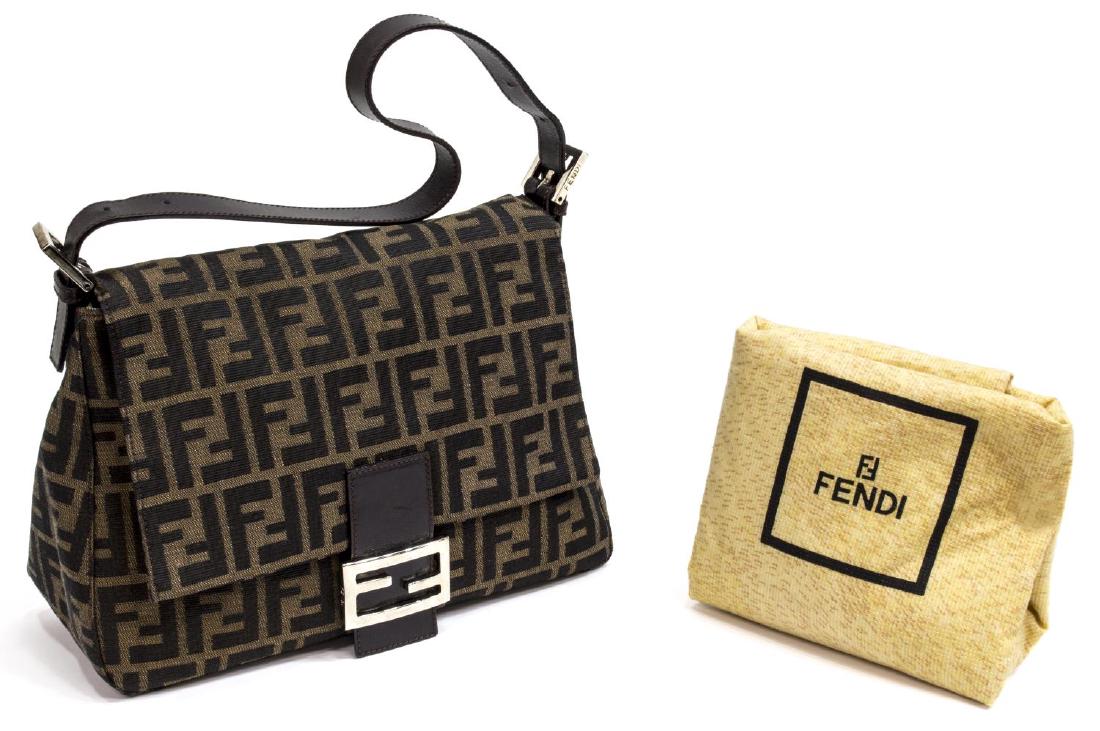 FENDI ZUCCA MONOGRAM CANVAS & LEATHER SHOULDER BAG: Fendi shoulder bag in brown Zucca monogram canvas, brown leather accents and adjustable shoulder strap, dark silver tone hardware, magnetic snap opening flap to green cloth lined interior with single