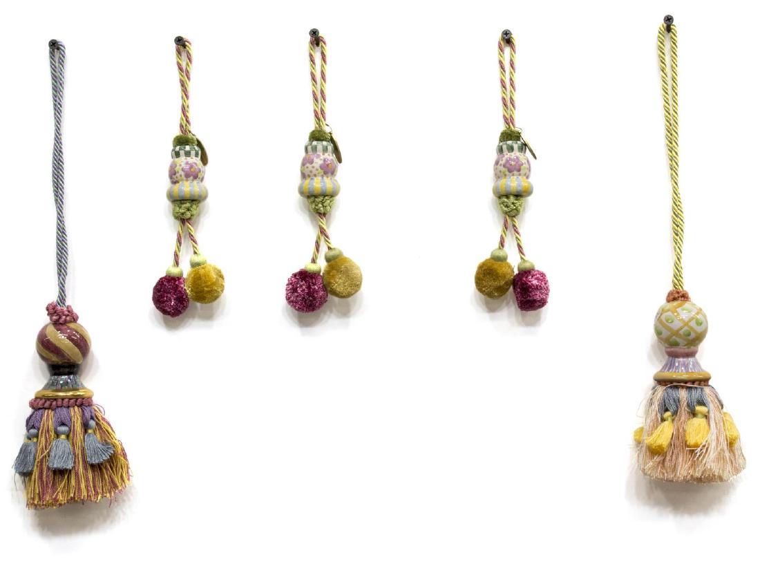 (5) MACKENZIE-CHILDS PAINTED CERAMIC TASSELS: (lot of 5) Mackenzie-Childs whimsical painted ceramic mounted tassels with fringe and balls, varied designs, longest: 14" (overall) *Provenance: Barnard's Antiques, Salado, Texas* Start Price: $40.00