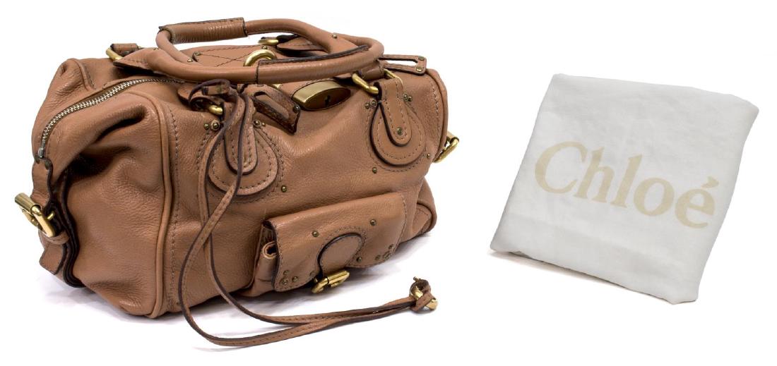 CHLOE 'PADDINGTON' GRAINED LEATHER HAND BAG: Chloe "Paddington" in dark peach leather with gold tone hardware, exterior flap pockets, top unzips to canvas lined interior with a zipper pocket, retaining signature lock and key, zippers are numbere