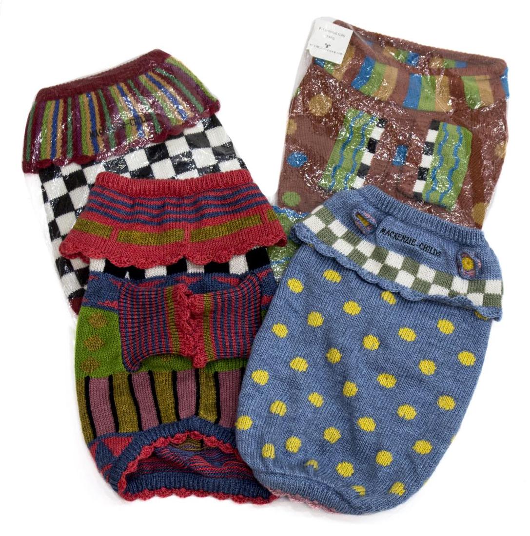 (4) MACKENZIE-CHILDS ASSORTED PET SWEATERS: (lot of 4) Mackenzie-Childs pet sweaters, all size medium in three varied patterns, 1lb *Provenance: Barnard's Antiques, Salado, Texas* Start Price: $50.00