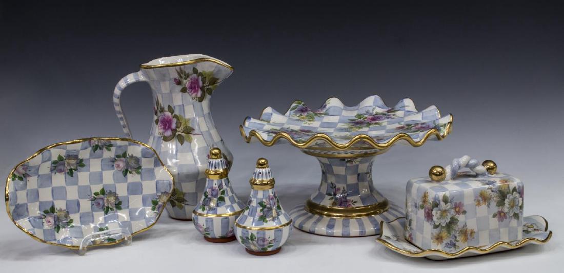 (7) MACKENZIE-CHILDS HONEYMOON MORNING GLORY GRP: (lot of 7) MacKenzie-Childs hand painted ceramic terra cotta tableware, in "Honeymoon" pattern, "Morning Glory" color, comprising: (1) cake stand, 6.5"h, 12" diam.; (1) tall pitcher, 10"h, 7"w; (3) sa