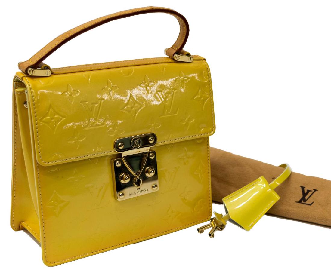LOUIS VUITTON SPRING STREET YELLOW VERNIS HANDBAG: Louis Vuitton "Spring Street" handbag in yellow monogram Vernis, leather top handle, gold tone hardware, metal lock to front, accompanied by clochette, keys and dust bag, some spotting to handle, ligh