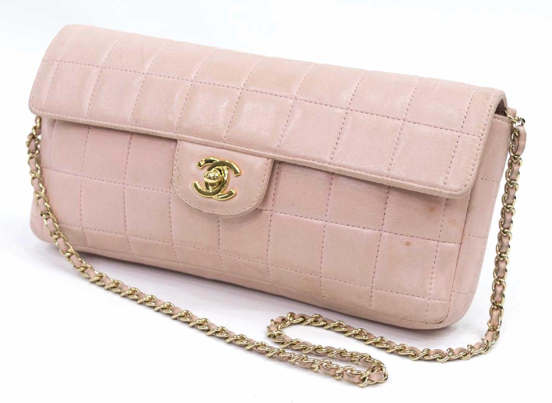 CHANEL QUILTED PINK LEATHER 'EAST WEST FLAP' BAG: Chanel "East West Flap" shoulder bag, in square quilted pink leather, CC turnlock closure to front, chain-link and leather shoulder strap, gold tone hardware, two slip pockets and lipstick holder to i