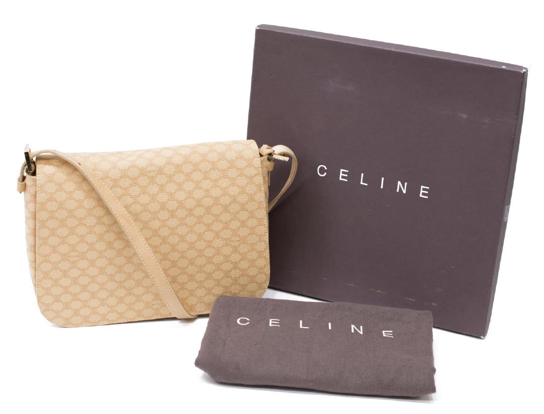 CELINE MONOGRAM COATED CANVAS FLAP SHOULDER BAG: Celine flap top shoulder bag in cream monogram coated canvas, having gold tone hardware, a single adjustable strap over the flap top, opening to front slot pocket and lined interior, slat pocket to ba