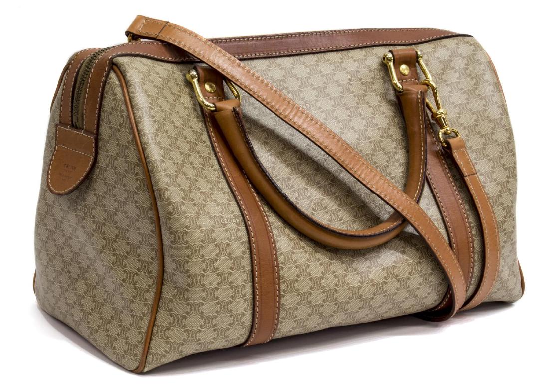 CELINE 'BOSTON' MONOGRAM CANVAS HANDBAG: Celine "Boston" handbag in coated Macadam monogram canvas, front open pocket with emblem to center, leather top handles and accents, gold tone hardware, zippered pocket to interior, accompanied by att