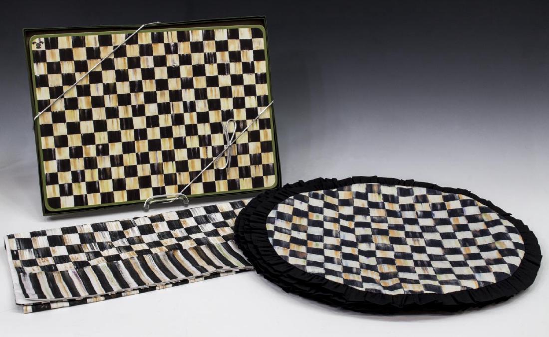 GROUP MACKENZIE-CHILDS COURTLY CHECK PLACEMATS: (lot) Collection of Mackenzie-Childs "Courtly Check" table accessories, new, including: (4) ruffled round place mats, new in original sealed bag, approx 17"diam; (1) table runner, approx 35"l, 15.5"w;