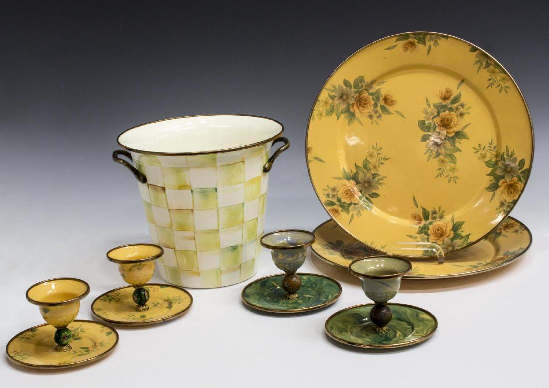 (7) MACKENZIE-CHILDS ENAMEL TABLEWARE COLLECTION: (lot of 7) MacKenzie-Childs enamel tableware, including: (4) egg cups, (two) decorated in pink evening primroses on yellow, (two) marble swirl in greens, blues and yellows, each approx 3"h, 5"diam; (2