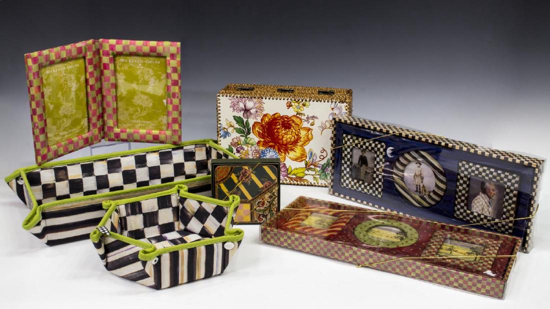 (7) COLLECTION MACKENZIE-CHILDS FRAMES, BASKETS: (lot of 7) Mackenzie-Childs decorative accessories, including (1) Holiday frame set, (1) Courtly frame set, (1) "Tulip Check" folding travel frame, (1) four piece "Hop Scotch" coaster set, (1) rattan