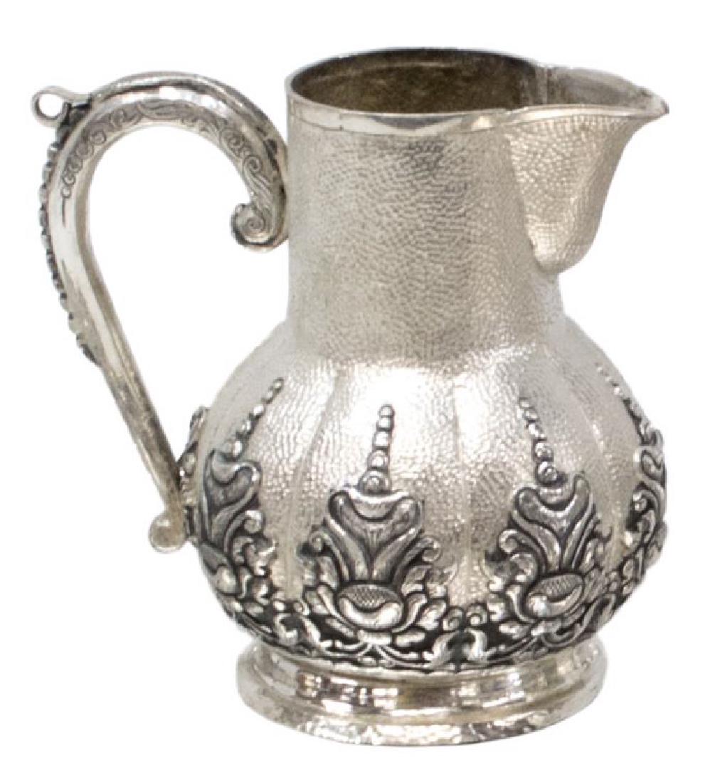 INDONESIAN .800 SILVER REPOUSSE YOGYA CREAMER (1 of 2)