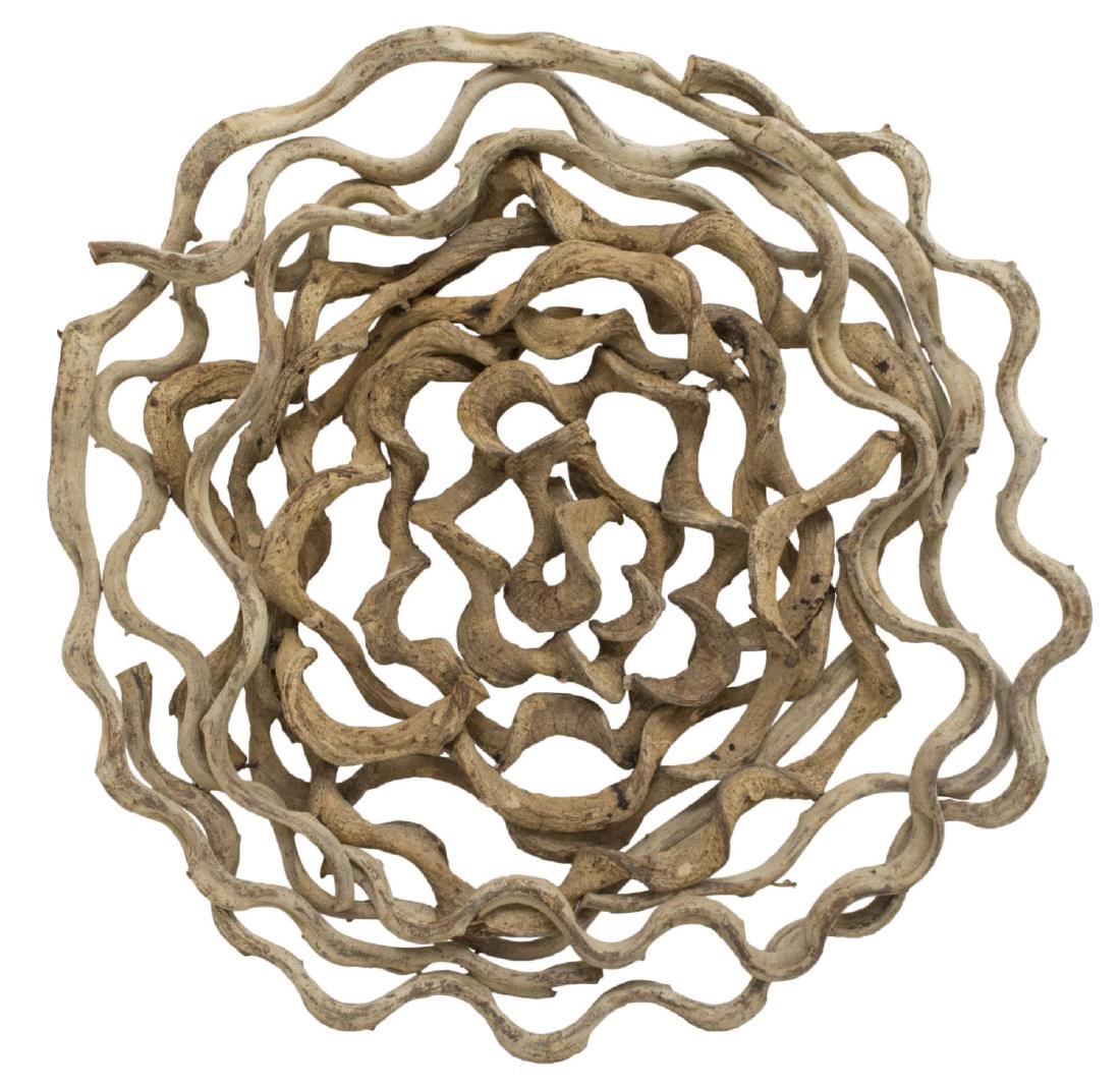 CIRCULAR NATURAL VINE DECORATIVE: Wall art constructed in A circular form with intertwining vines, approx. 37" diameter. 18lbs Start Price: $80.00