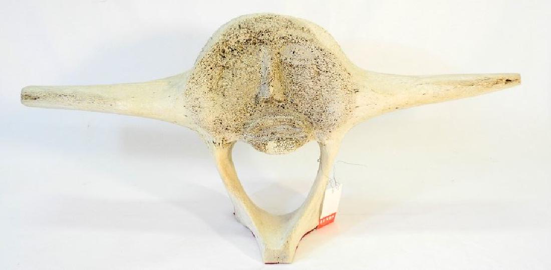 Inuit carved whalebone sun, 12"x 28".: Inuit carved whalebone sun, 12"x 28".