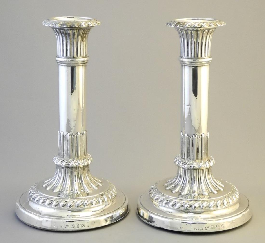 Pair of silver candlesticks 8".