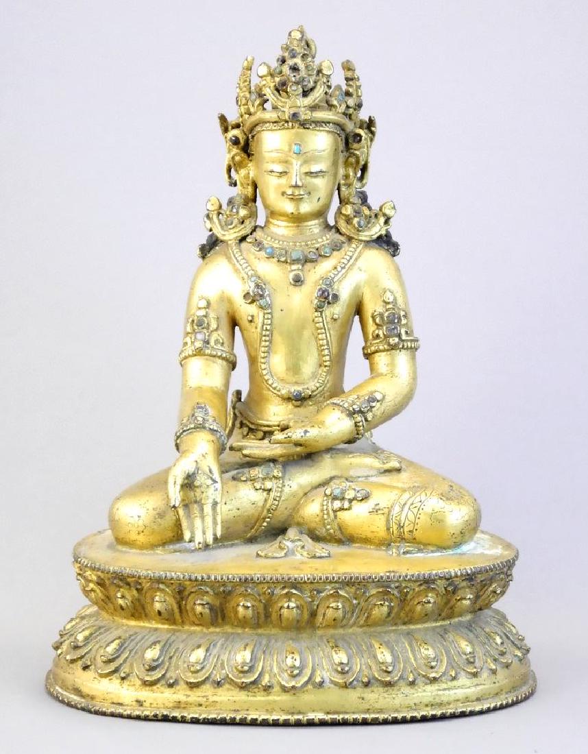 Oriental gilt metal figure of a seated Buddha, 7 3/8". (1 of 5)