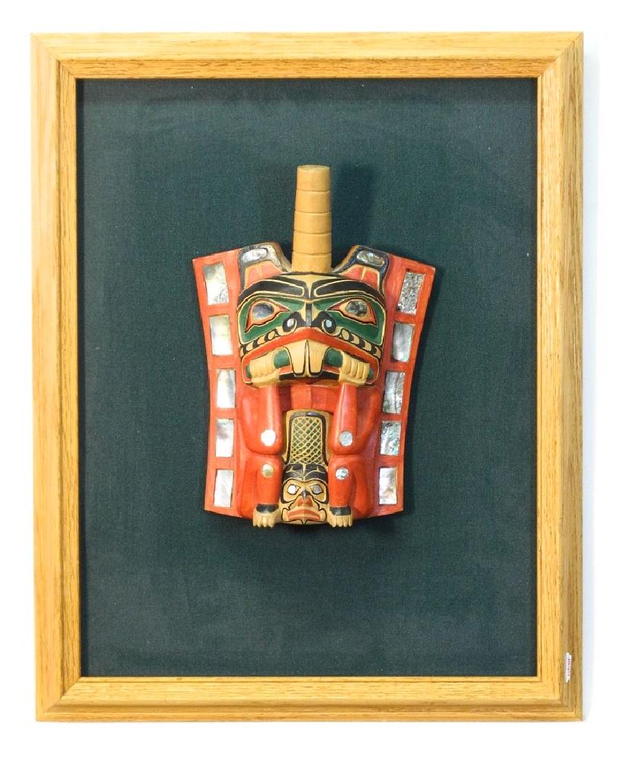 Carved and painted cedar frontlet att. to Tony Hunt: Carved and painted cedar frontlet att. to Tony Hunt mounted on plaque, 10".