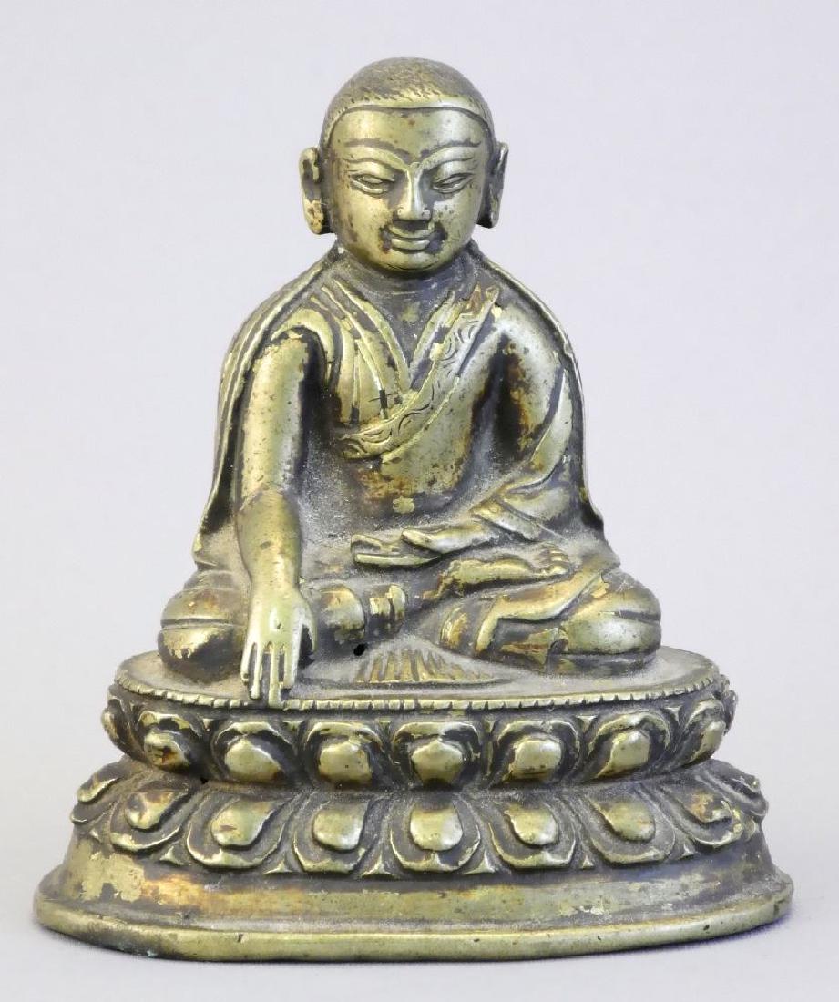 Small gilt metal figure of a seated Buddha- rolled (1 of 6)