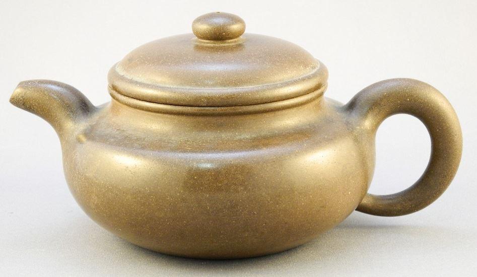 Early 20th century Yixing polished manganese brown: Early 20th century Yixing polished manganese brown teapot, 7 1/2".