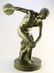 Bronze figure of a discus thrower, 16 1/8" in height.