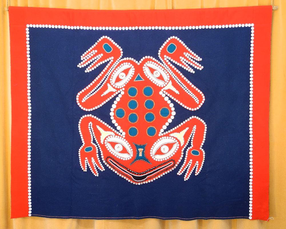 Elaborately decorated button blanket with frog design, (1 of 2)