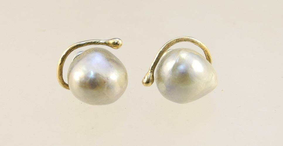 Pair of grey baroque pearl stud earrings.: Pair of grey baroque pearl stud earrings.