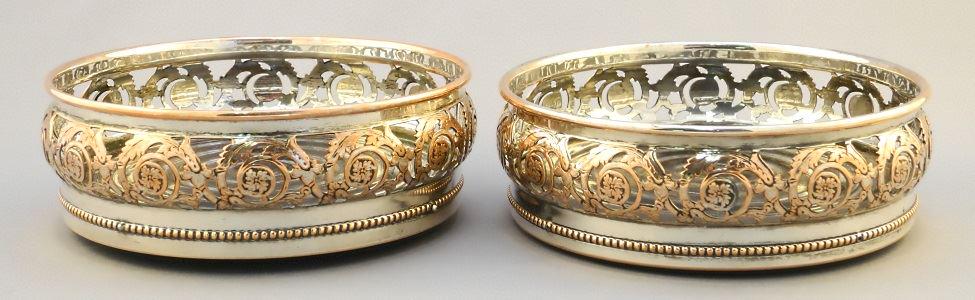 Pair of plated wine coasters.: Pair of plated wine coasters.