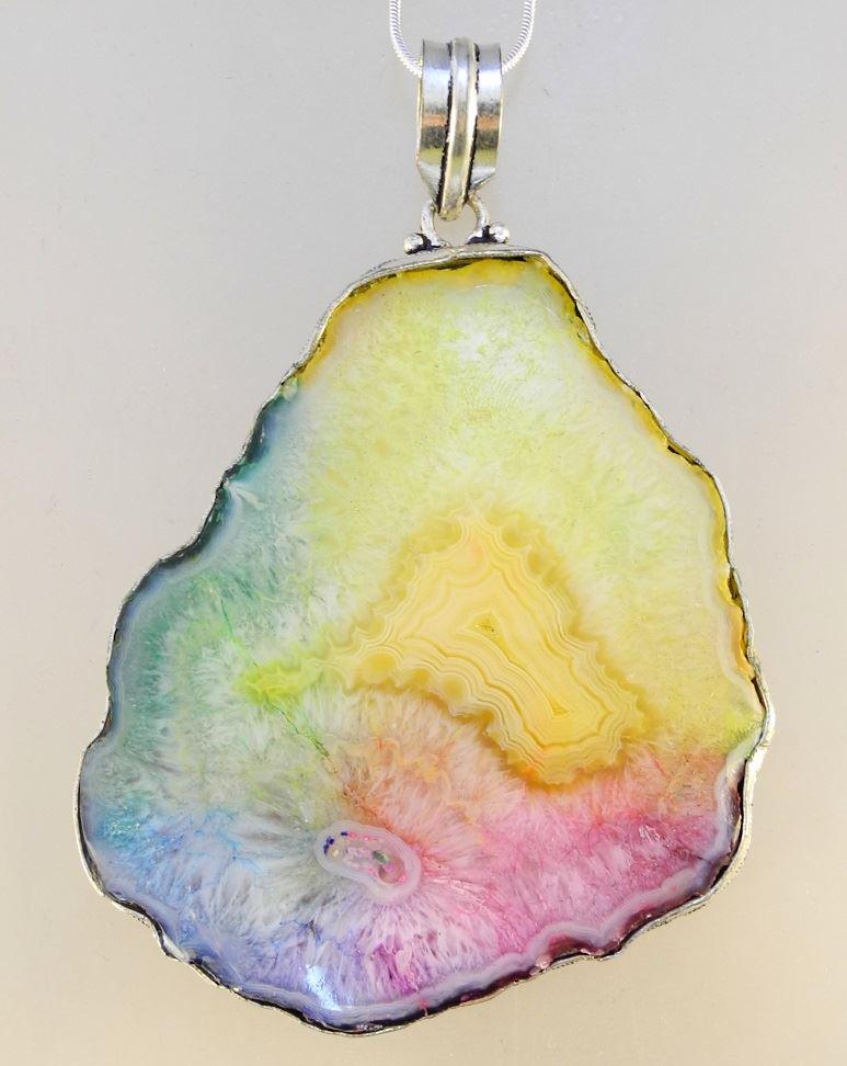 Silver mounted rainbow agate on chain. (1 of 2)