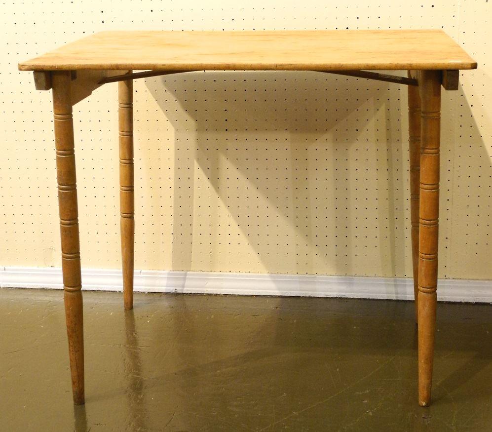 Old folding table with turned legs. (1 of 2)
