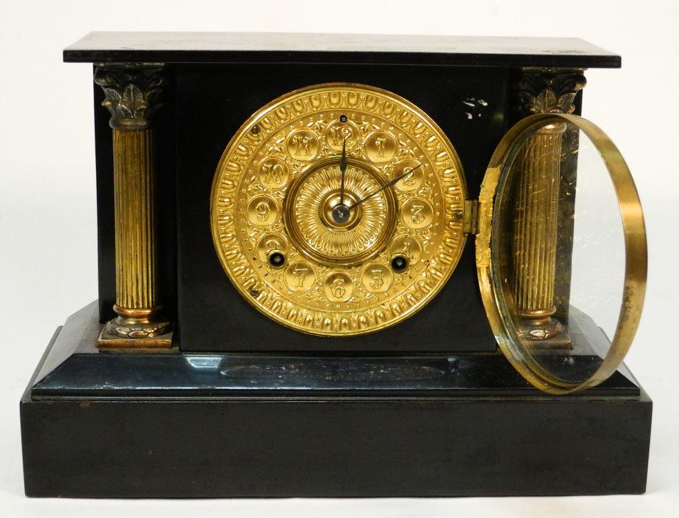 Cast iron neoclassical mantle clock, with gilt embossed (1 of 2)