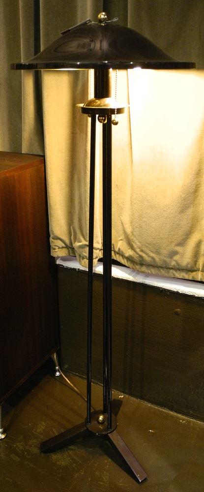 Gloss bronze finish contemporary tricolumn floor lamp,: Gloss bronze finish contemporary tricolumn floor lamp, 48" high.