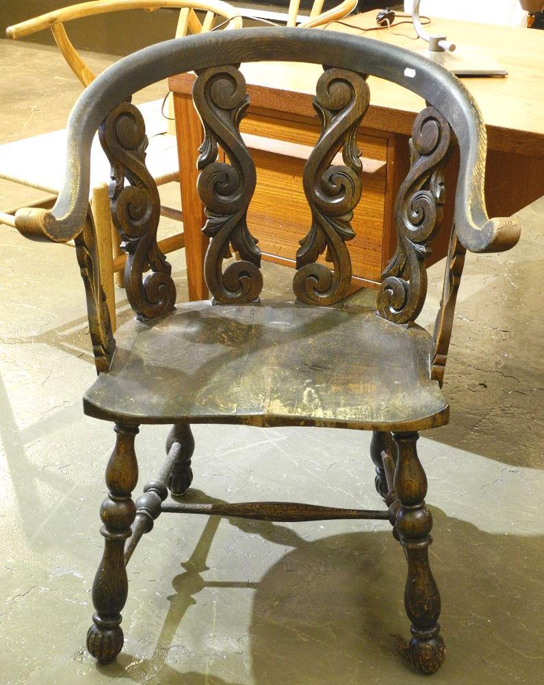 Carved open armchair.: Carved open armchair.
