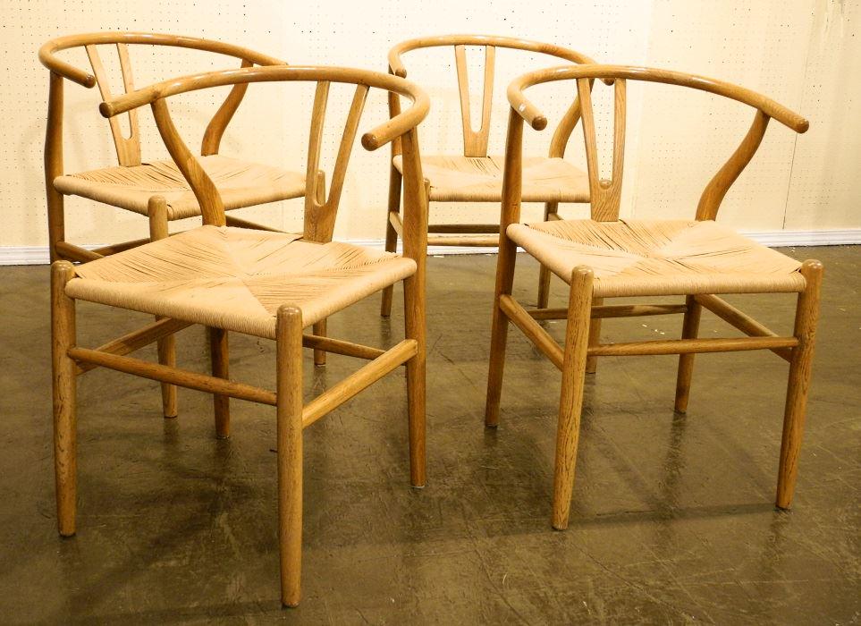 Four Wegner-style wishbone chairs.: Four Wegner-style wishbone chairs.
