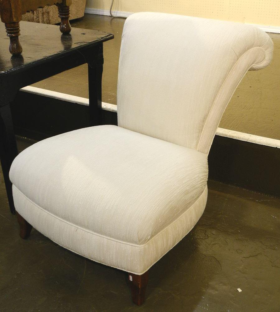 Pair of Jordan's scroll back low chairs.: Pair of Jordan's scroll back low chairs.