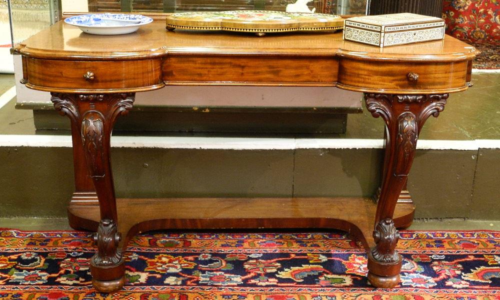 Victorian mahogany writing table. (1 of 4)