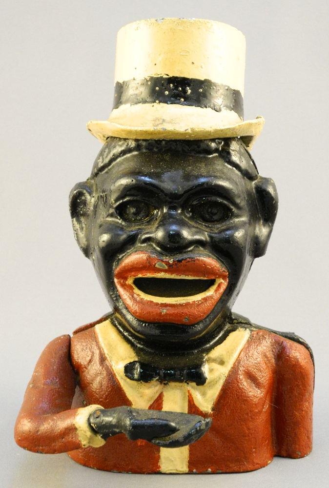 Vintage Black Americana cast iron bank, 8" high. (1 of 3)