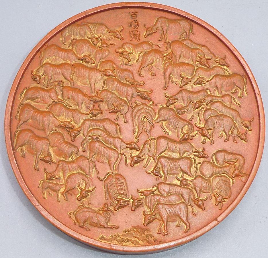 Gilt decorated "Fortune of Hundred Bulls" cinnabar ink: Gilt decorated "Fortune of Hundred Bulls" cinnabar ink stock, K'ang Hsi mark.