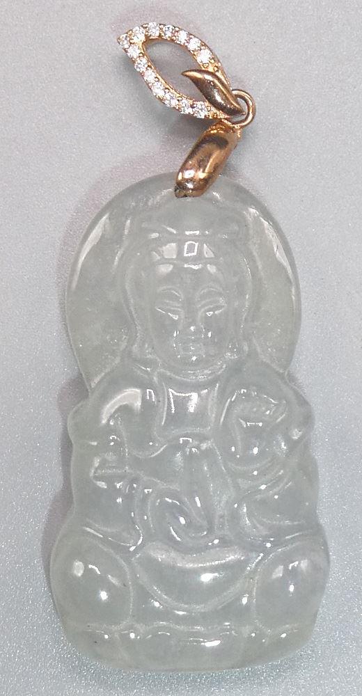 Pale icy Jadeite Pendant of Avalokitesvara with: Pale icy Jadeite Pendant of Avalokitesvara with Sterling silver (925 stamped) bail.