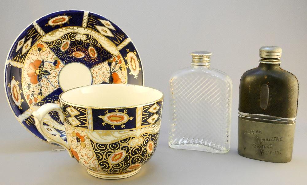 Two vintage glass flasks (1 Whyte & Mackay) and an: Two vintage glass flasks (1 Whyte & Mackay) and an Adams Imari cup & saucer, 8" diameter.