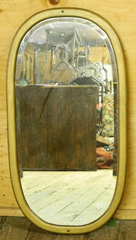 Gilt framed oval plate glass mirror, 38 3/4" wide. (1 of 1)