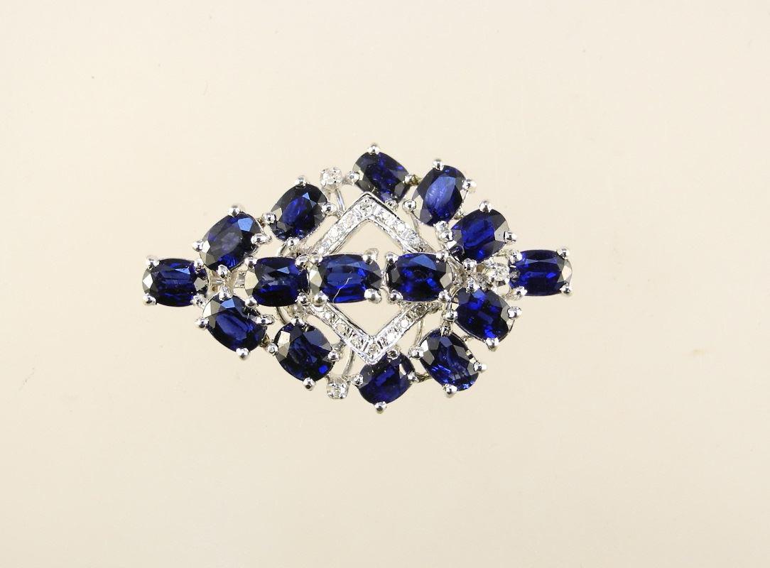 14K gold brooch set with blue sapphires. (1 of 4)