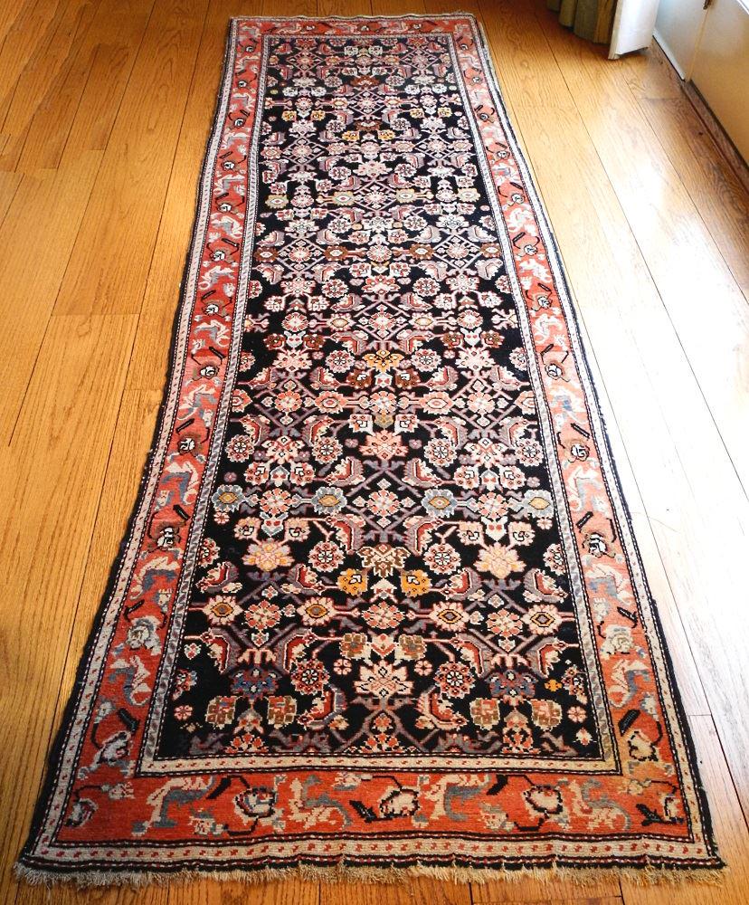 Kurdish runner, approximately 11'10" x 3'7". (1 of 5)