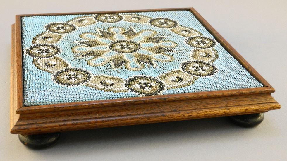 Victorian beaded trivet.: Victorian beaded trivet.