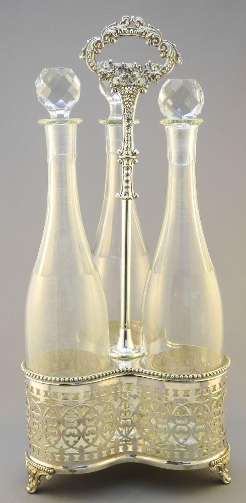 Antique 3 Bottle Tantalus Set in Silver Plated Stand, (1 of 7)