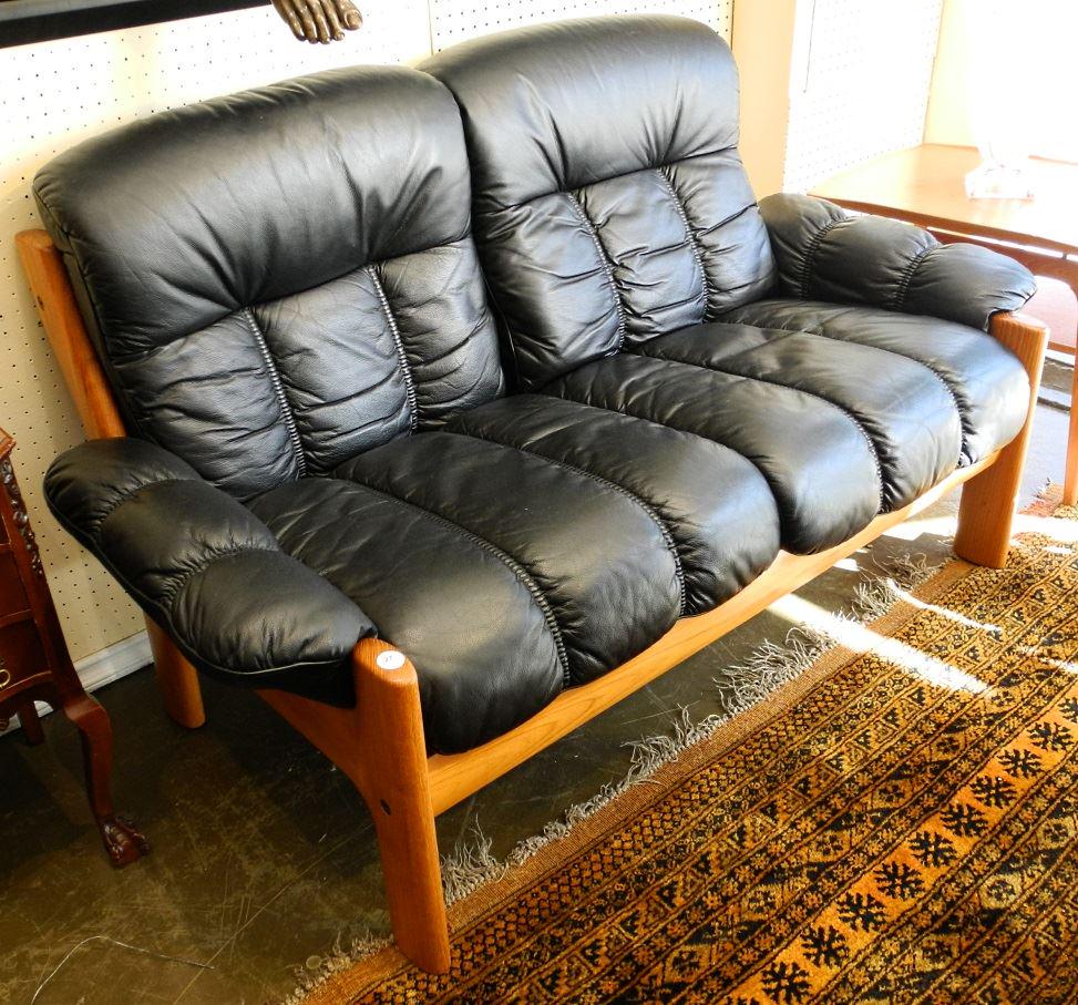 Teak Frame Loveseat with Black Leather Upholstery.: Teak Frame Loveseat with Black Leather Upholstery.