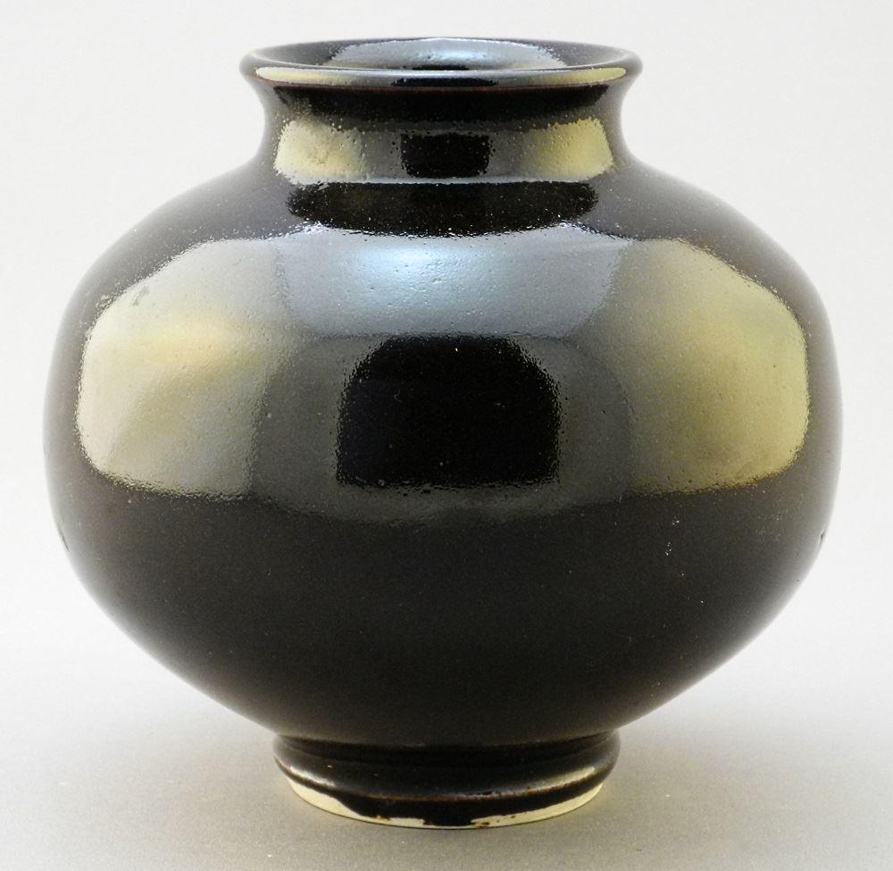Porcelain Vase with Black Glaze Signed with Chop by: Porcelain Vase with Black Glaze Signed with Chop by Wayne Ngan, 5" high.
