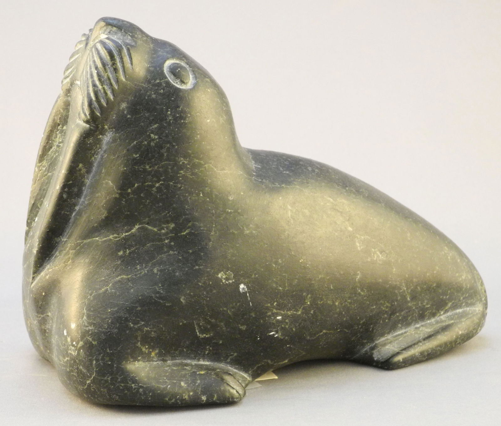Inuit Stone Carving of a Walrus signed with Syllabus & (1 of 4)