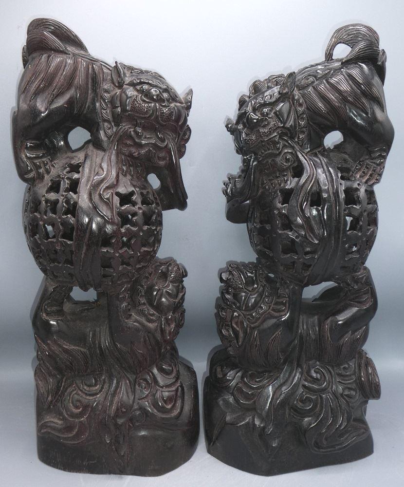 Pair of Openwork Tan Wood "Dragon Pearl Sculptures,: Pair of Openwork Tan Wood "Dragon Pearl Sculptures, Ch'ieng-lung Mark, 19 1/2" high.
