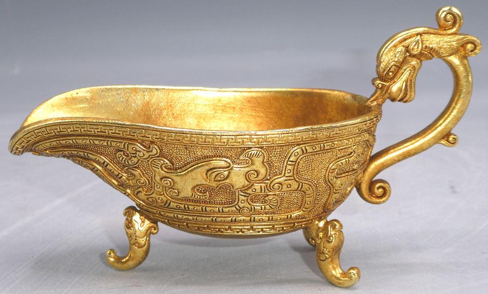 Parcel Gilt "Sons of Dragon" Scoop, Chen-kuan Reign: Parcel Gilt "Sons of Dragon" Scoop, Chen-kuan Reign Mark, 5 1/4" length.
