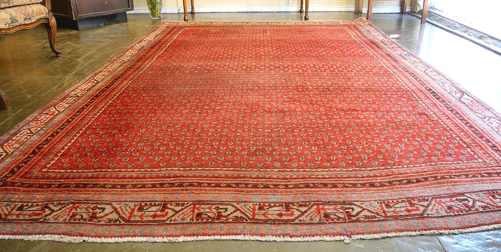 Iranian Hand Knotted Carpet, approximately 9'9" x 6'1". (1 of 2)