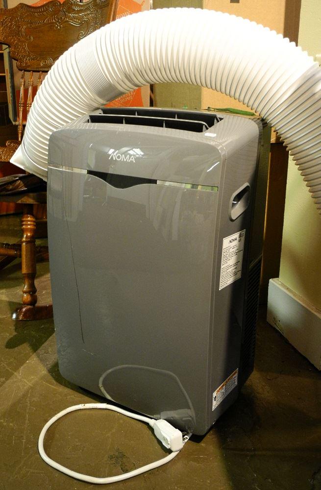 Air conditioner unit / humidifier by Noma. (1 of 2)